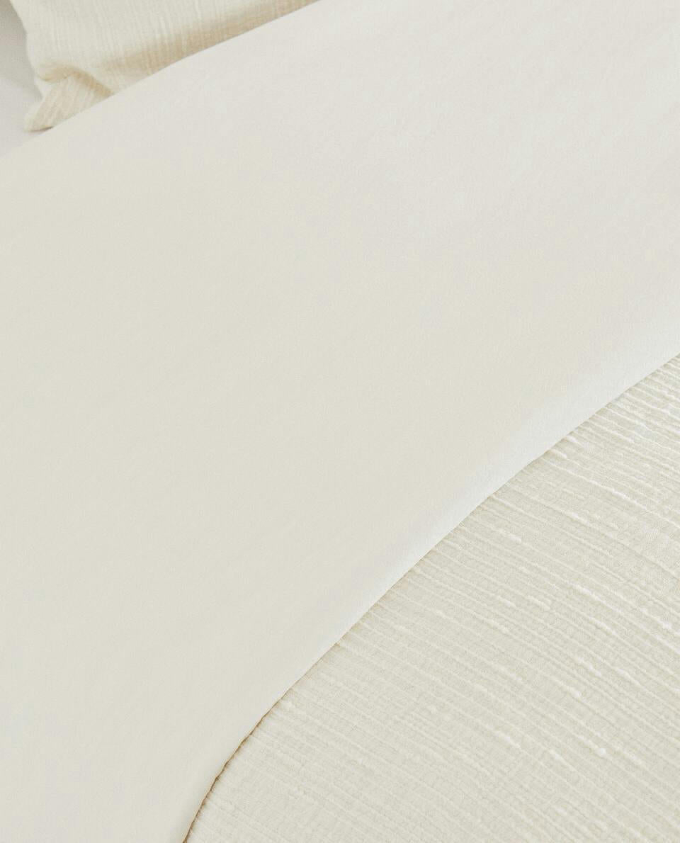 Bettbezug mit erhöhtem Tagesdeckeneffekt 