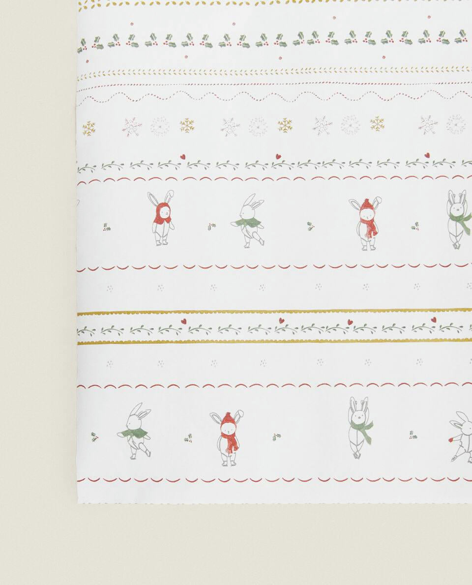 CHILDREN’S WRAPPING PAPER WITH CHRISTMAS BUNNY RABBITS