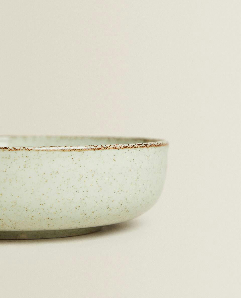 PORCELAIN BOWL WITH ANTIQUE FINISH RIM
