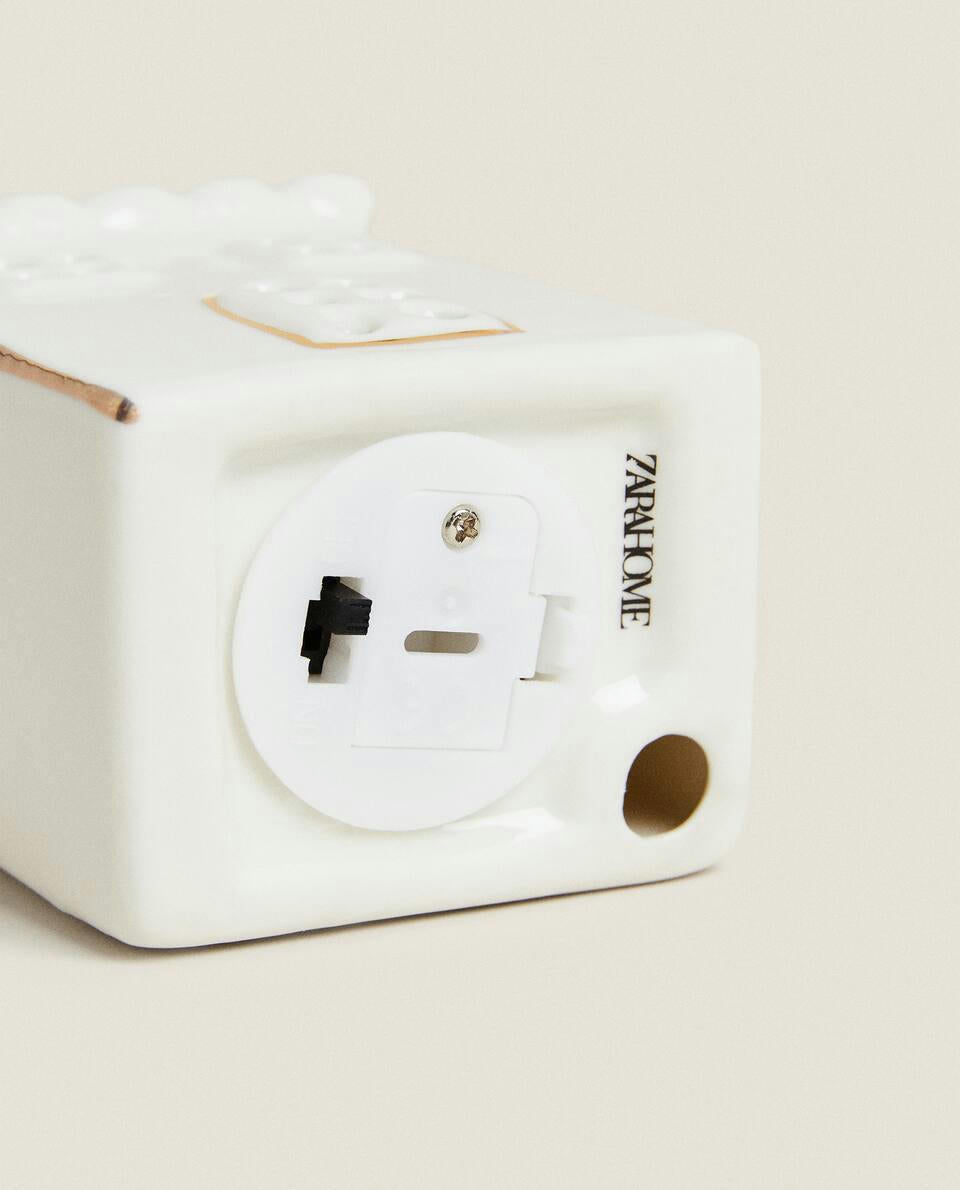 Weihnachtsdekoration aus Keramik mit Beleuchtung 