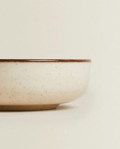 PORCELAIN BOWL WITH ANTIQUE FINISH RIM