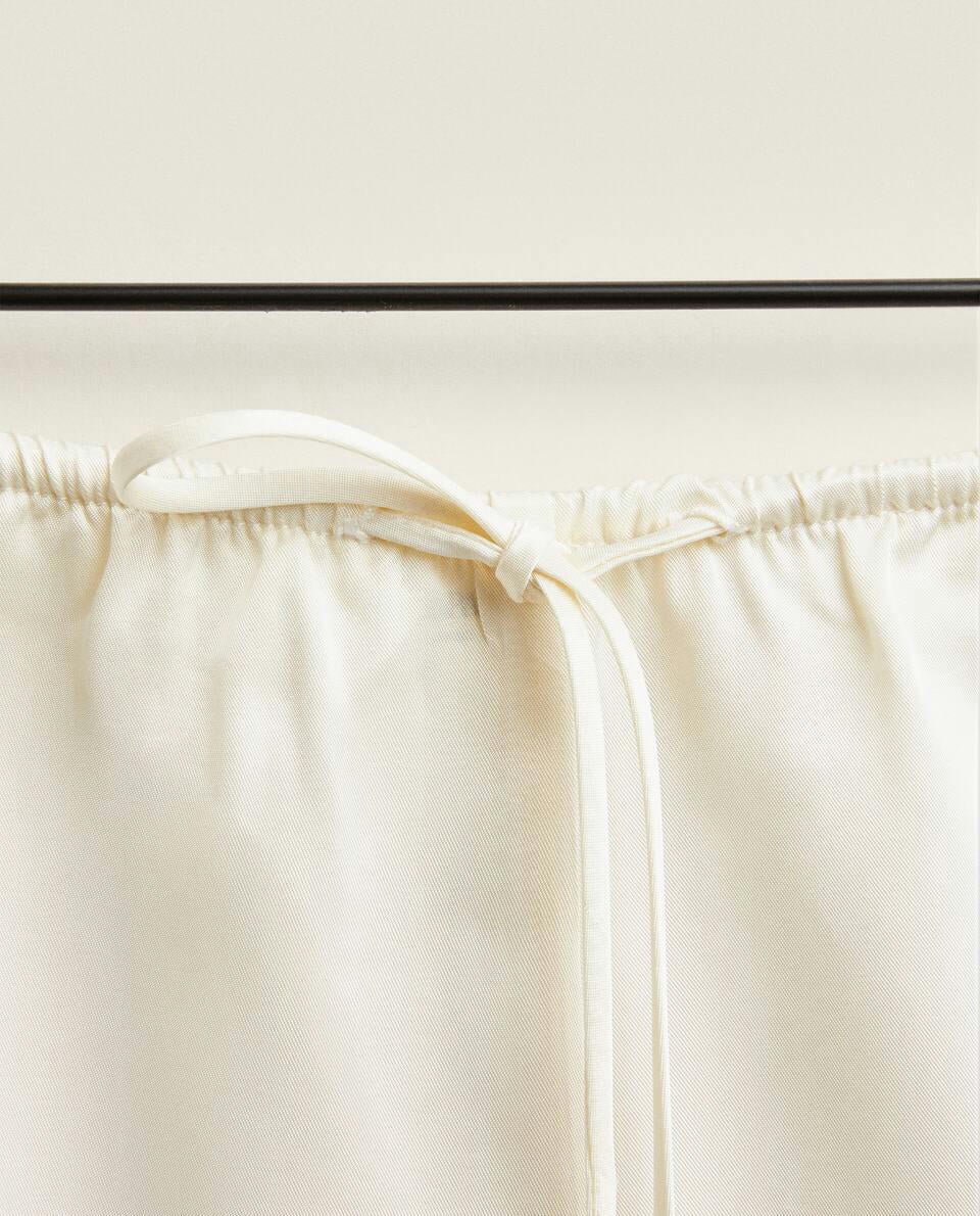 SATIN SHORTS WITH BLONDE LACE